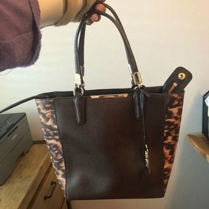Brown Authentic Coach tote purse animal print side